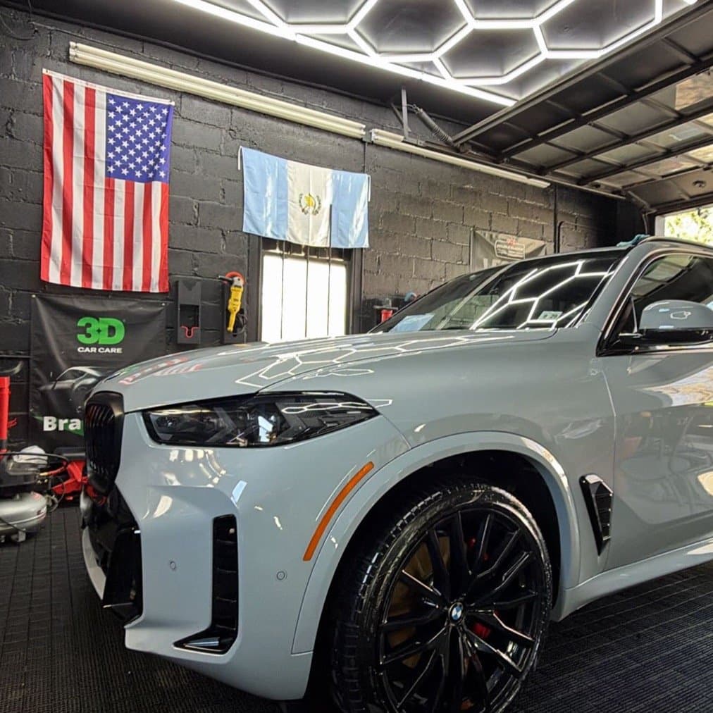 BMW X5 detailed inside the Insane Auto Detailing shop in Piscataway
